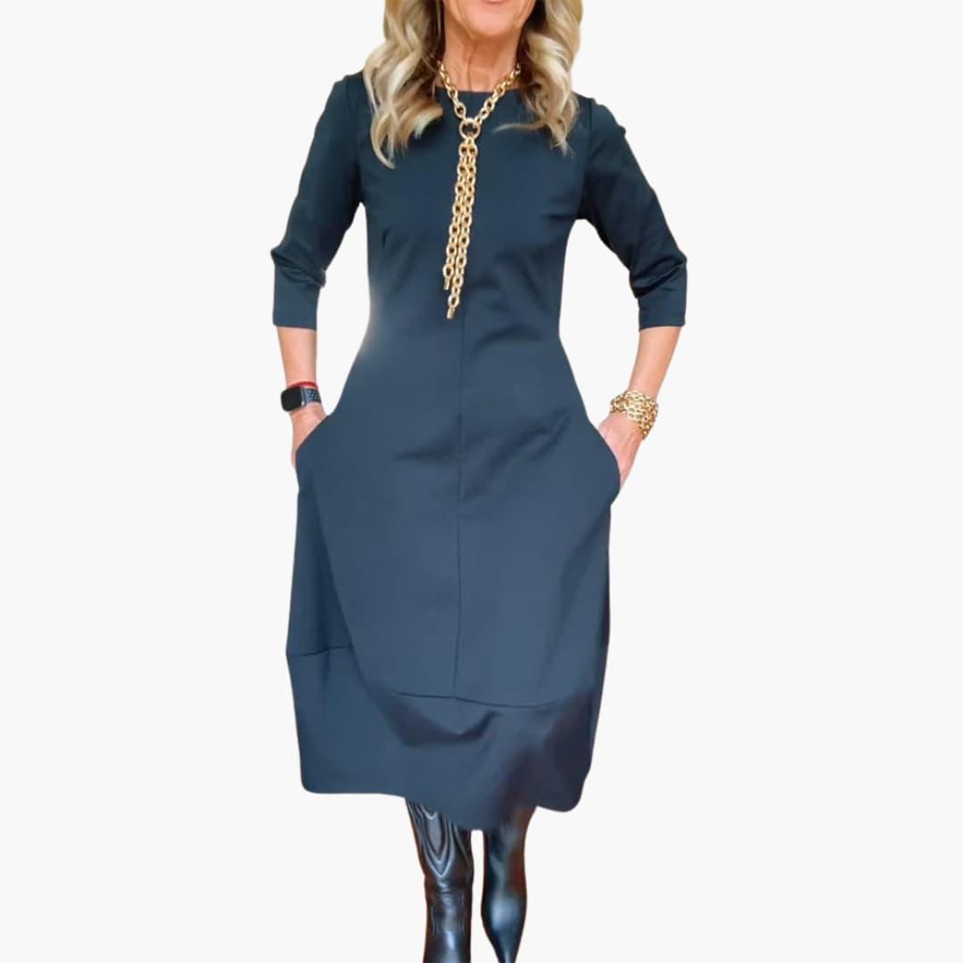 Jolie | Round Neck Three Quarter Sleeve Side Pockets Curved Hem Autumn Midi Dress Women