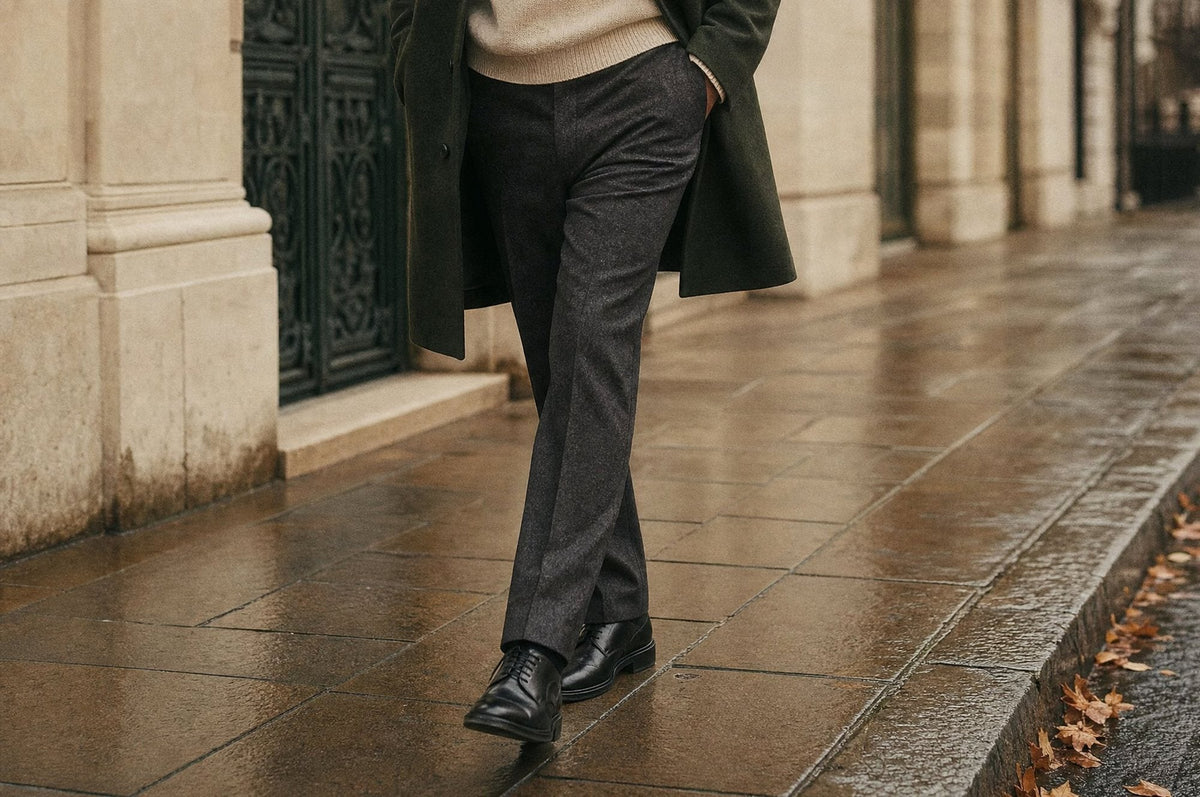 Charcoal tailored trousers and derby shoes on a London pavement